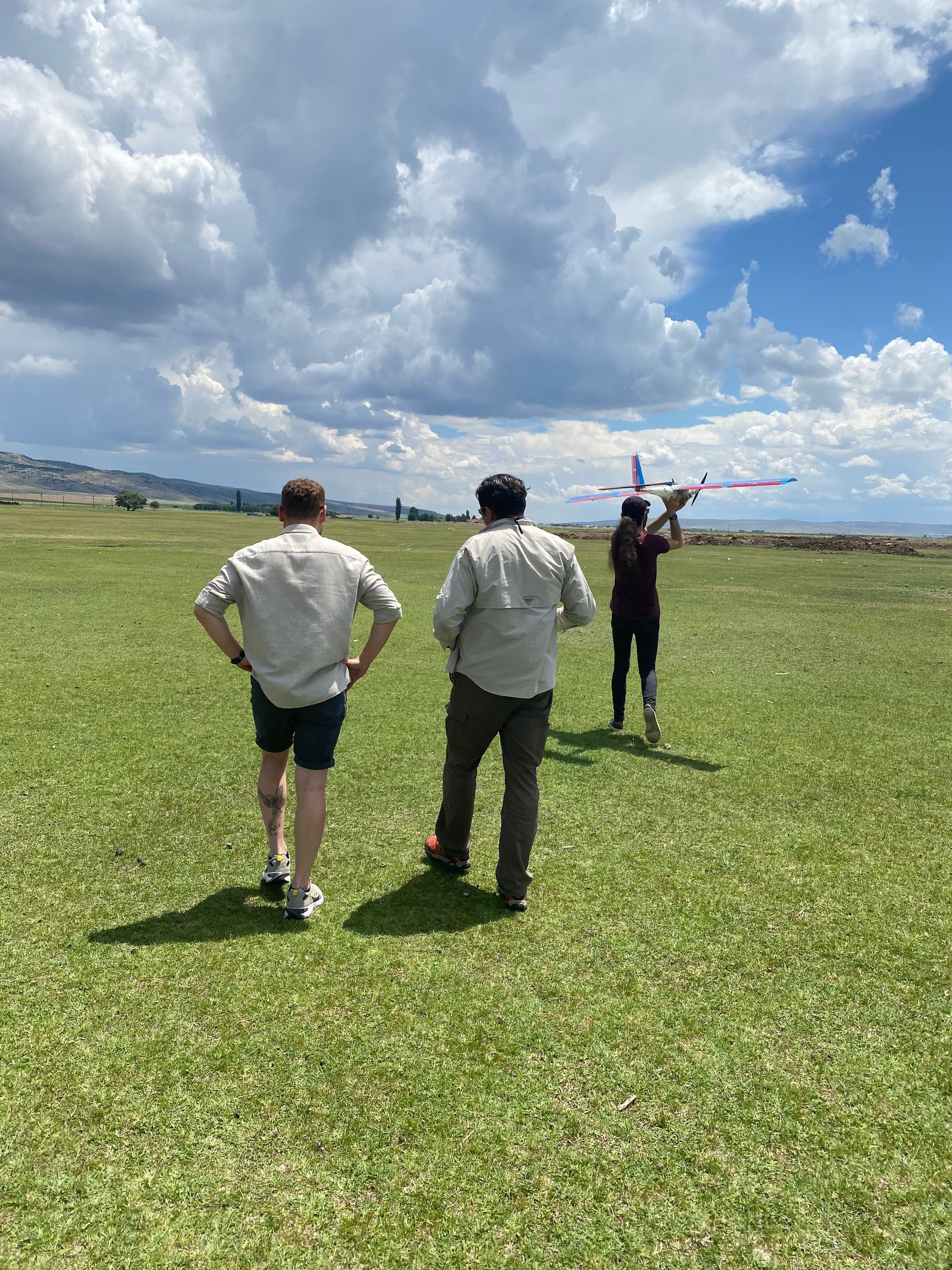 Getting ready for a hand launch on a grass airfield
