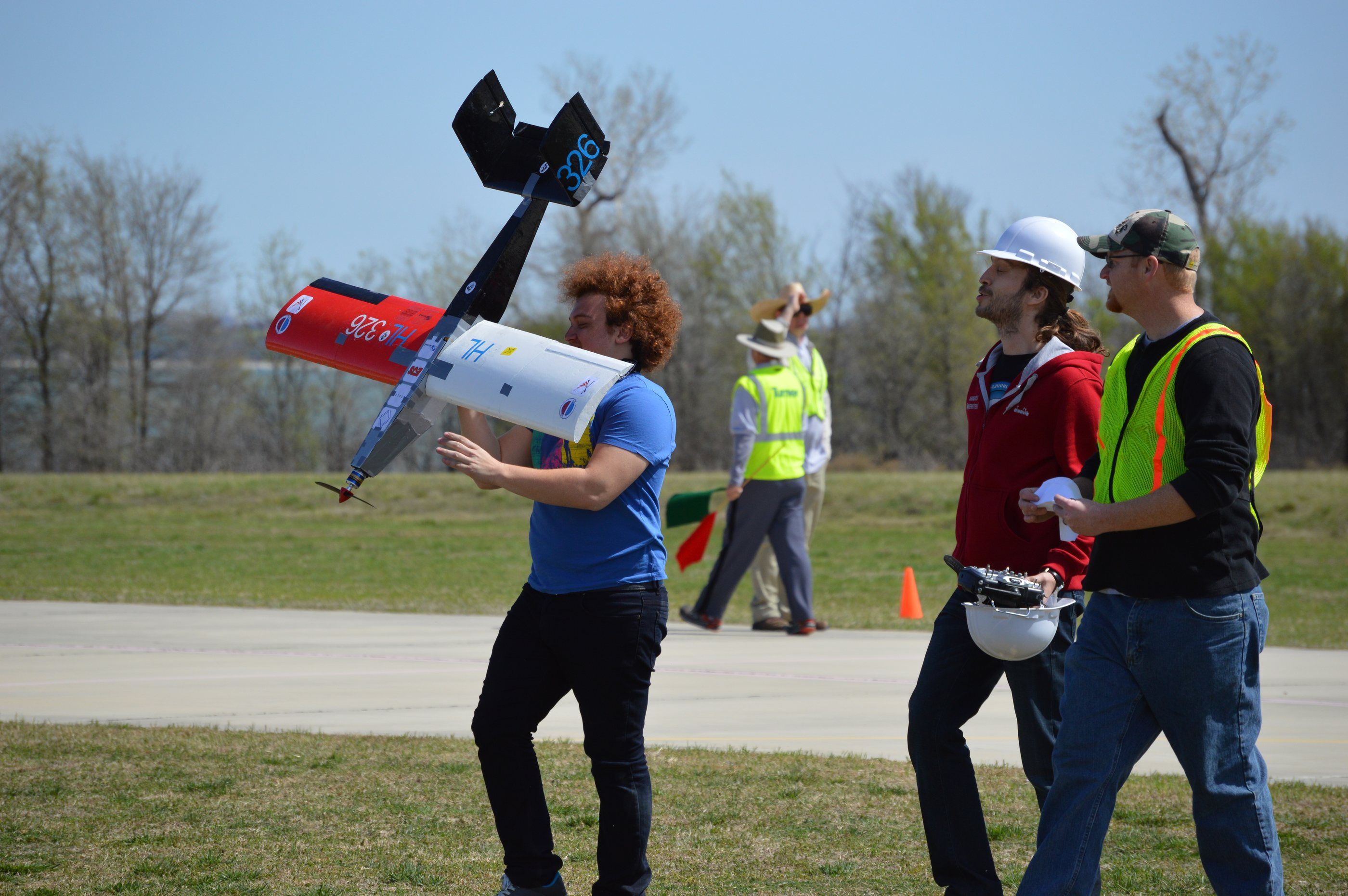 2014, SAE Aero Design, Texas: Carrying the aircraft to the flight line.